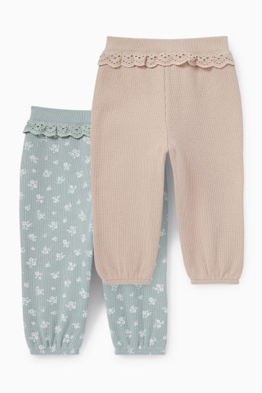 Baby: meisjes - Set van 2 - bloemetjes - babyjoggingbroek - mintgroen