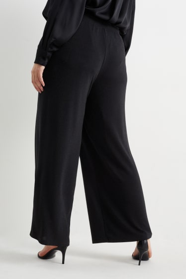 Teens & young adults - CLOCKHOUSE - jersey trousers - wide leg - black