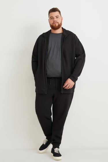 Uomo - Pantaloni sportivi - nero