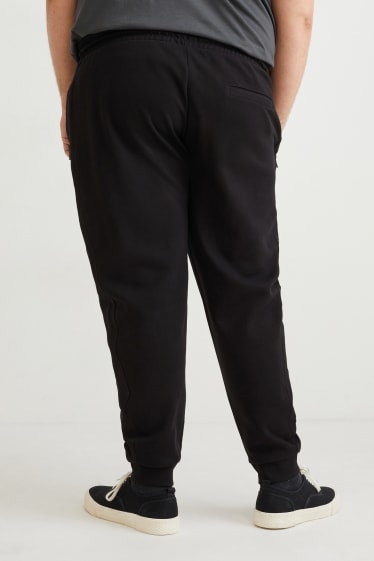 Uomo - Pantaloni sportivi - nero