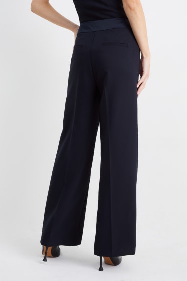 Kobiety - Spodnie biznesowe - wysoki stan - szerokie nogawki - ciemnoniebieski