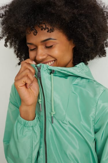 Damen - Jacke mit Kapuze und Tasche - faltbar - grün