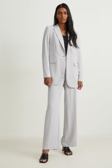 Kobiety - Spodnie biznesowe - wysoki stan - szerokie nogawki - jasnoszary