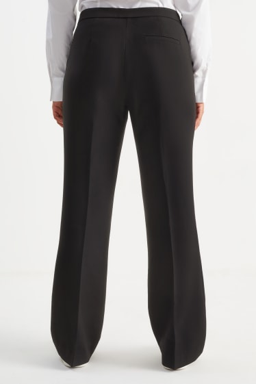 Dona - Pantalons de tela - high waist - flared - negre