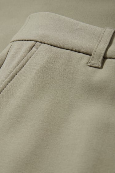 Jóvenes - CLOCKHOUSE - pantalón de tela - mid waist - wide leg - verde claro