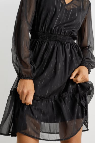 Dámské - Šaty fit & flare s výstřihem ve tvaru V - černá