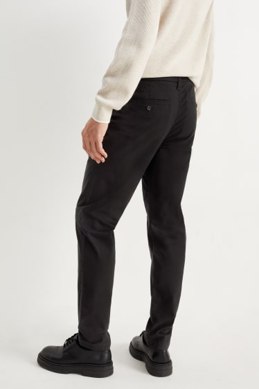 Pánské - Kalhoty chino - tapered fit - Flex - černá