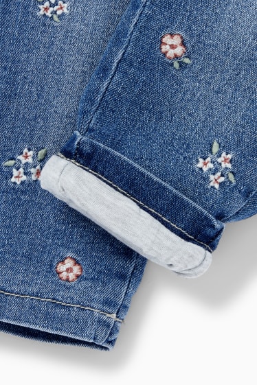 Niemowlęta - Ciepłe dżinsy niemowlęce - w kwiatki - dżins-niebieski