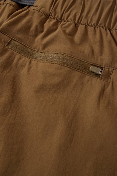 Home - Pantalons tècnics curts - marró