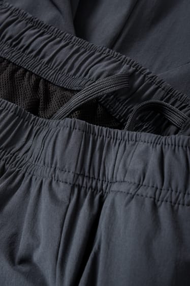 Pánské - Funkční teplákové kalhoty - tmavomodrá