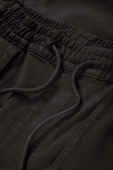 Mężczyźni - Spodnie bojówki - tapered fit - czarny