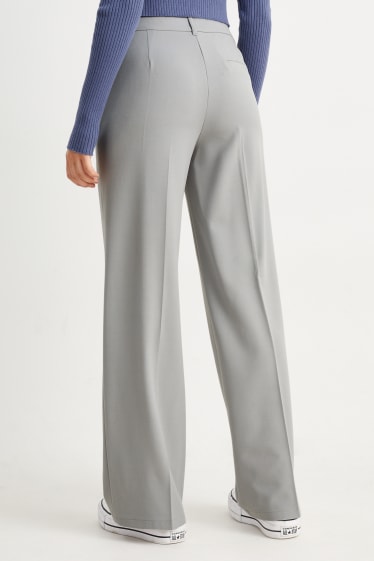 Jóvenes - CLOCKHOUSE - pantalón de tela - mid waist - wide leg - gris