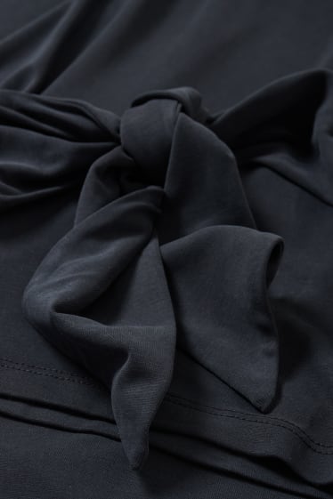 Women - Long sleeve top with knot detail - black