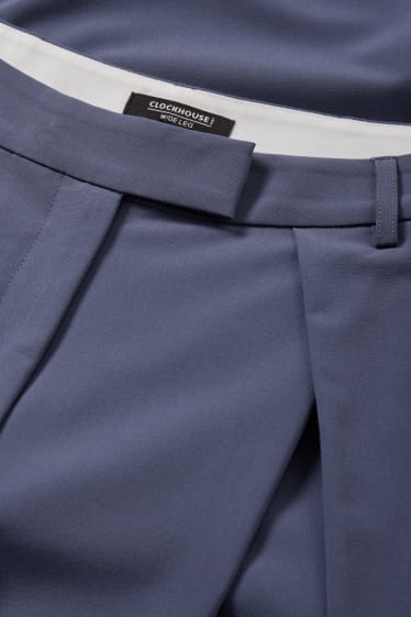 Kobiety - CLOCKHOUSE - spodnie materiałowe - średni stan - szerokie nogawki - ciemnoniebieski