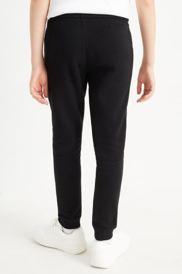 Kinder Buben - Jogginghose - genderneutral - schwarz