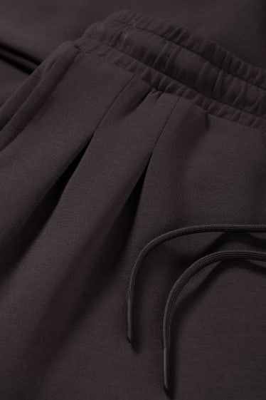 Mujer - Pantalón de deporte funcional - gris oscuro