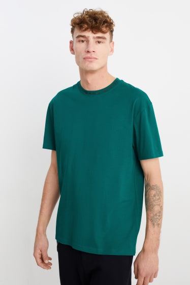 Mężczyźni - T-shirt - ciemnozielony
