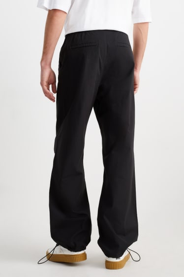 Men - Parachute trousers - black