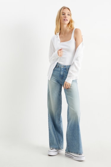 Dospívající a mladí - CLOCKHOUSE - wide leg jeans - mid waist - džíny - světle modré