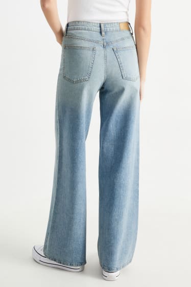 Dospívající a mladí - CLOCKHOUSE - wide leg jeans - mid waist - džíny - světle modré