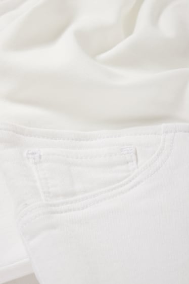 Dámské - Těhotenské džíny - jegging jeans - bílá