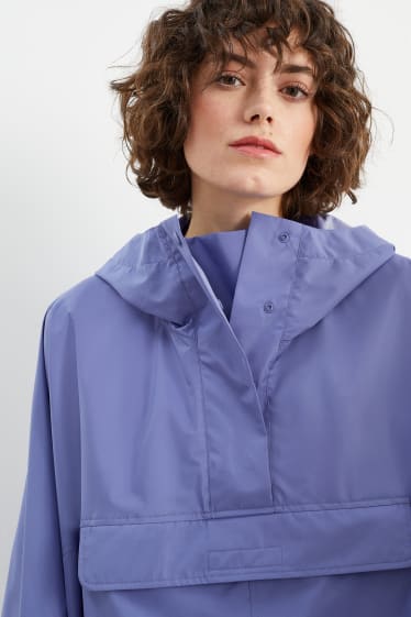 Women - Rain cape with hood - foldable - purple