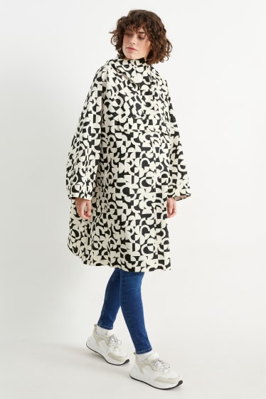 Women - Rain cape with hood - foldable - patterned - black
