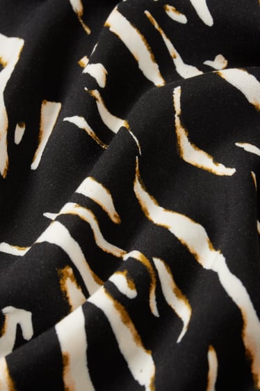 Dames - A-lijn-jurk van viscose - met patroon - zwart / beige