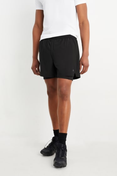 Uomo - Shorts sportivi - 4 Way Stretch - effetto sovrapposto - nero