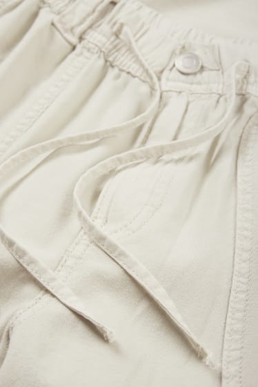 Jóvenes - CLOCKHOUSE - pantalón cargo - mid waist - wide leg - gris claro