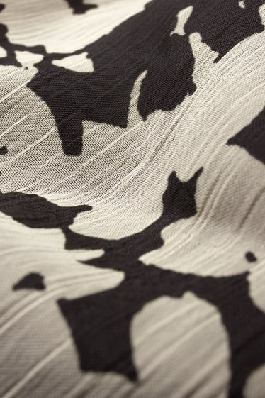 Damen - Fit & Flare Kleid mit V Ausschnitt - geblümt - schwarz / beige