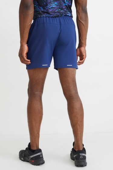 Home - Pantalons curts tècnics - blau