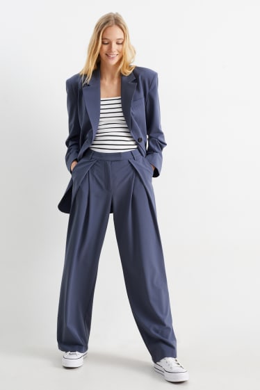 Kobiety - CLOCKHOUSE - spodnie materiałowe - średni stan - szerokie nogawki - ciemnoniebieski