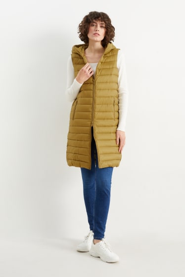 Women - Long quilted gilet - mustard yellow