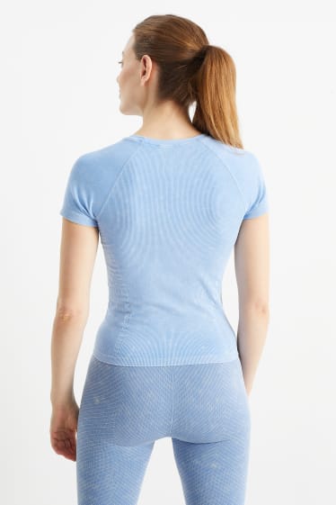 Dona - Samarreta de màniga curta tècnica - sense costures - protecció UV - blau clar