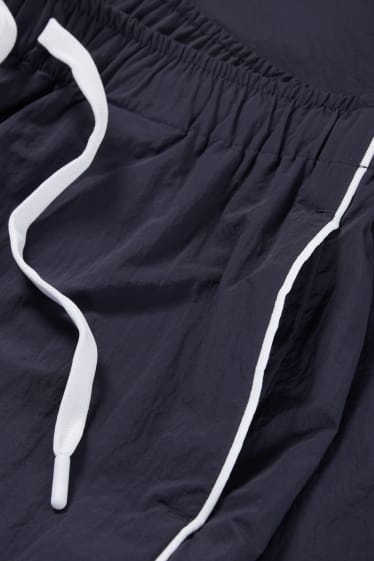 Ados & jeunes adultes - CLOCKHOUSE - pantalon de jogging - bleu foncé