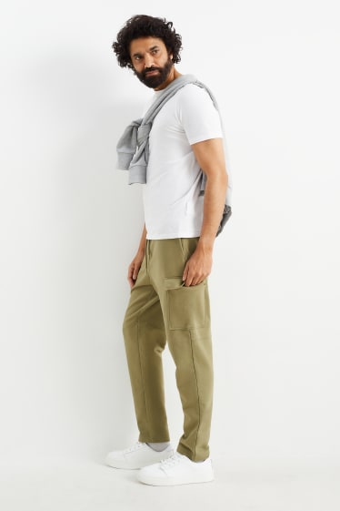 Mężczyźni - Spodnie dresowe bojówki - kaki