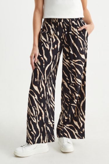 Donna - Pantaloni - vita alta - gamba ampia - con motivi - nero / beige