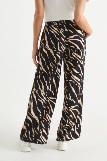 Dames - Pantalon - high waist - wide leg - met patroon - zwart / beige