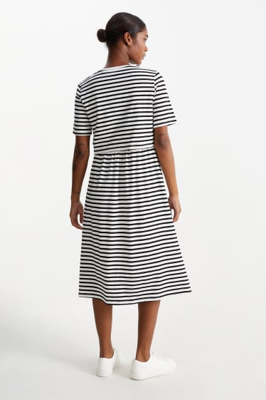 Women - Maternity dress - striped - black / white