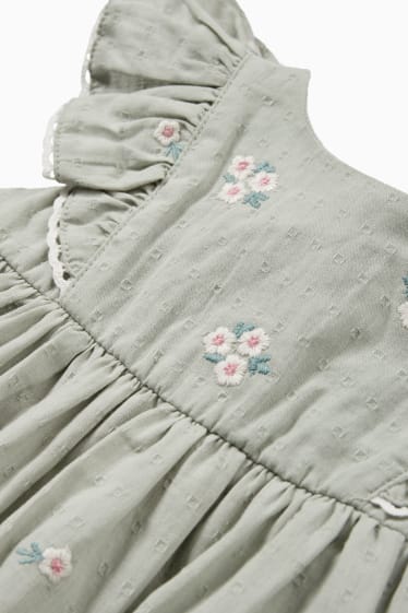 Niemowlęta - Sukienka niemowlęca - w kwiaty - miętowa zieleń