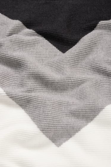 Femei - Pulover cu guler drept - negru / alb
