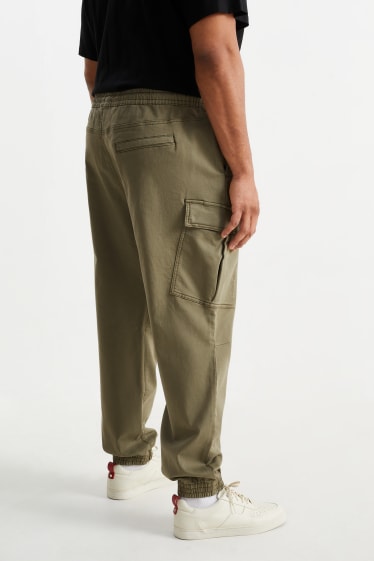 Mężczyźni - Spodnie bojówki - tapered fit - LYCRA® - kaki