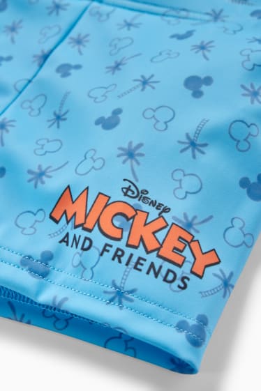 Miminka - Mickey Mouse - plavky pro miminka - LYCRA® XTRA LIFE™ - světle modrá