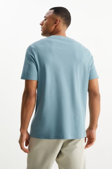 Uomo - T-shirt - in materiale tramato - turchese