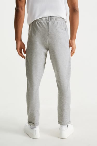 Home - Pantalons de xandall - gris clar jaspiat