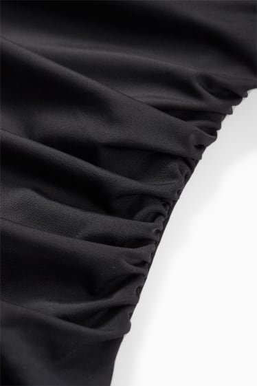 Dámské - Jednodílné dámské plavky s řasením - s vycpávkami - tvarující efekt - černá