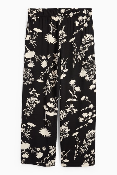 Dámské - Žerzejové kalhoty - straight fit - s květinovým vzorem - černá