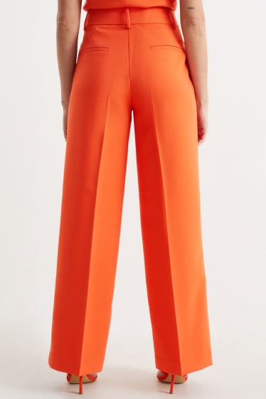 Women - Cloth trousers - high waist - wide leg - orange