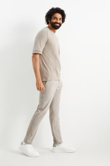 Uomo - Pantaloni chino - tapered fit - beige chiaro